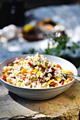 Rice salad with pepper, mushrooms, sweetcorn, carrots and olives