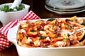 Pasta bake with minced meat, vegetables and sheep's cheese