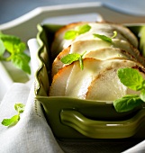 Gratinated turnips with lemon sauce and mint