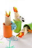 Wraps filled with vegetable crudités in children's cups