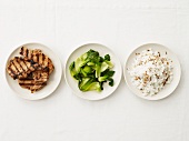 Entree Parts in Three Dishes; Pork, Bok Choy and Rice; From Above