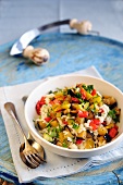 Mixed vegetable risotto with sweet bell peppers, aubergines, courgettes and parsley