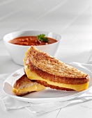 Grilled Cheese Sandwich; Halved; Bowl of Tomato Soup