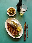 Grilled New York Strip Steak with Baked Potato and Beer