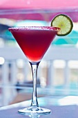 Hibiscus Infused Tequila Margarita with Sugared Rim and Lime Garnish