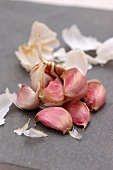 Garlic cloves on a slate surface