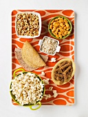 Assorted Grain Based Products: Taco Shells, Tortillas, Whole Grain Fusilli, Popcorn, Rice, Cereal and Goldfish Crackers