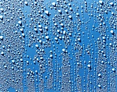 Water droplets on a blue surface