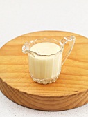 A jug of vanilla sauce