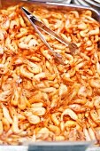Many Shrimp with Tongs at a Market in Spain