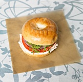 Organic Bagel Sandwich with Veggie Cream Cheese, Onion, Tomato and Chia Sprouts