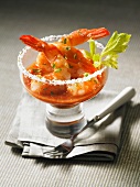 Prawn cocktail with Bloody Mary sauce in a glass with a salted rim