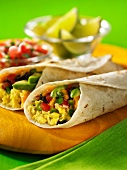 Breakfast wraps with scrambled eggs and avocado
