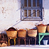 Baskets of dried food outside building