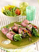 Roast beef rolls filled with lettuce