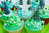 Various blue Christmas cupcakes