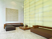 Sitting area in lobby with illuminated wall