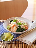 Rice noodles with king prawns and limes (Asia)
