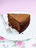 A slice of chocolate cake on a plate