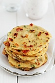 Semolina biscuits made with wheat semolina, chickpea flour, tomatoes and chillis (India)