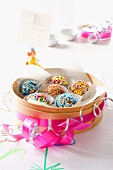 Chocolate balls decorated with colourful sugar sprinkles