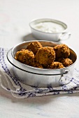 Rice and herb balls with a yogurt dip