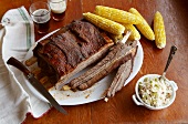 Barbecue Buffalo Ribs with Corn on the Cob and Coleslaw