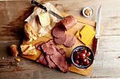 Buffalo Charcuterie; Pastrami, Salami and Cheese on Cutting Board
