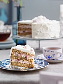 Buckwheat cake with lingonberries, cream and meringue