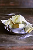 Green tea ice cream parfait with matcha sticks