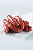 Debrecener sausages on a piece of paper