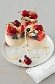 Vanilla desserts with fruits and slivered almonds