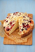 Yeast cake with cherries and slivered almonds