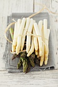 White and green asparagus on a cloth