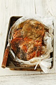 Roasted turkey leg in a roasting bag