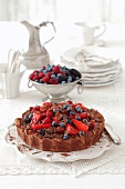 Chocolate cake topped with berries