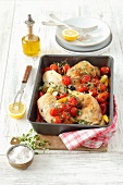 Chicken legs with peppers and cherry tomatoes
