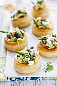 Vol-au-vents with asparagus, scrambled egg, oyster mushrooms and goat's cheese