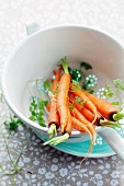 Carrots in a sieve