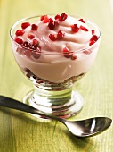 Glass Dish of Cherry Cheesecake Yogurt with Pomegranate Seeds