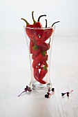 Red chilli peppers in a glass