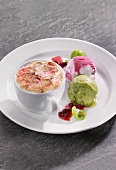 Raspberry souffle with Brussels sprouts and cherry yogurt ice cream