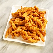 Fried Clam Strips on a White Dish