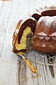 A marble Bundt cake with poppy seeds