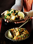 Potatoes with spinach, and aubergine and squash curry (India)