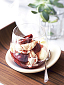 Grilled plums with meringue and orange sauce