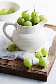 Gooseberries in a white pitcher