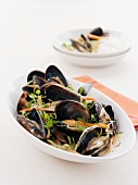 Mussels in broth with carrots and coconut milk