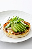 Cheese, bacon and avocado on an English muffin
