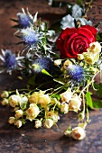 Bouquet of flowers with roses and thistles